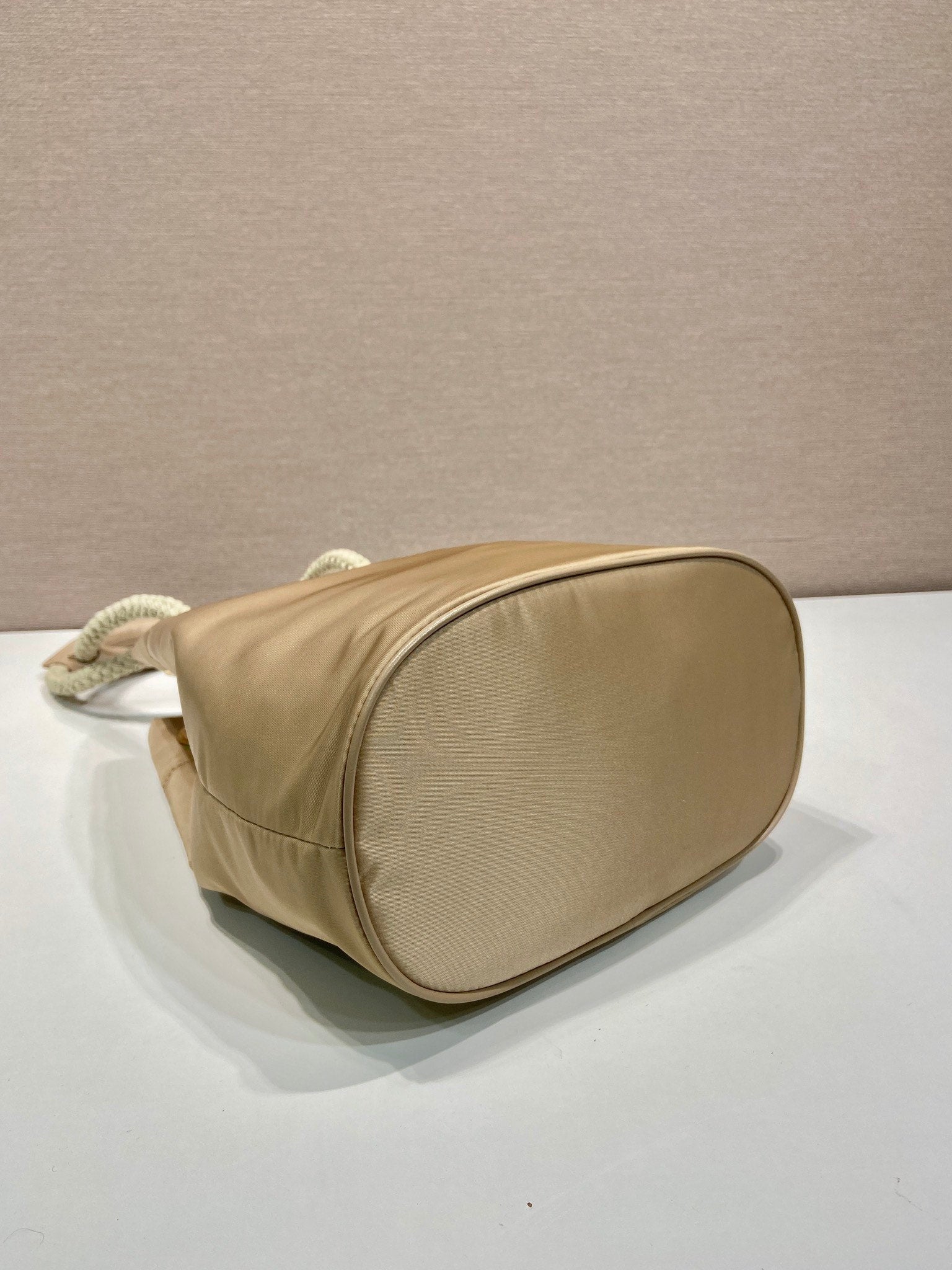 BUCKET BAG 28 IN BEIGE RE-NYLON GOLD LOGO